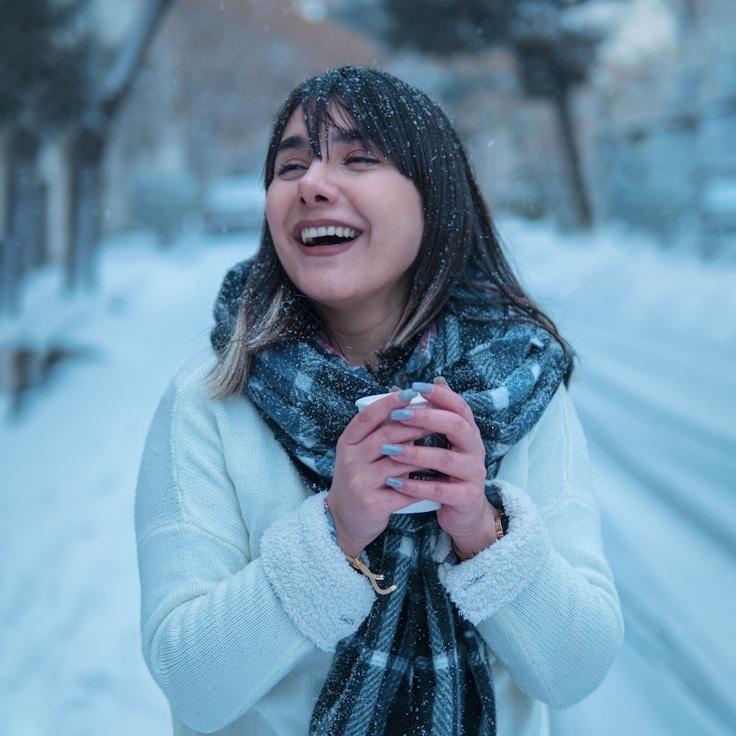 Alexei Sun, Lead Design Curator at EmberMoteTinder, reviewing corporate floral arrangements